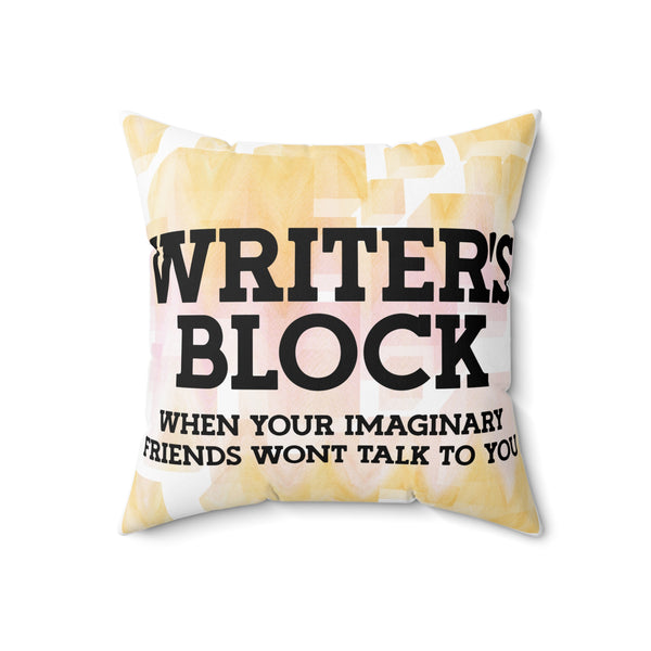 Pillow with text 'WRITER'S BLOCK WHEN YOUR IMAGINARY FRIENDS WON'T TALK TO YOU' on a white background