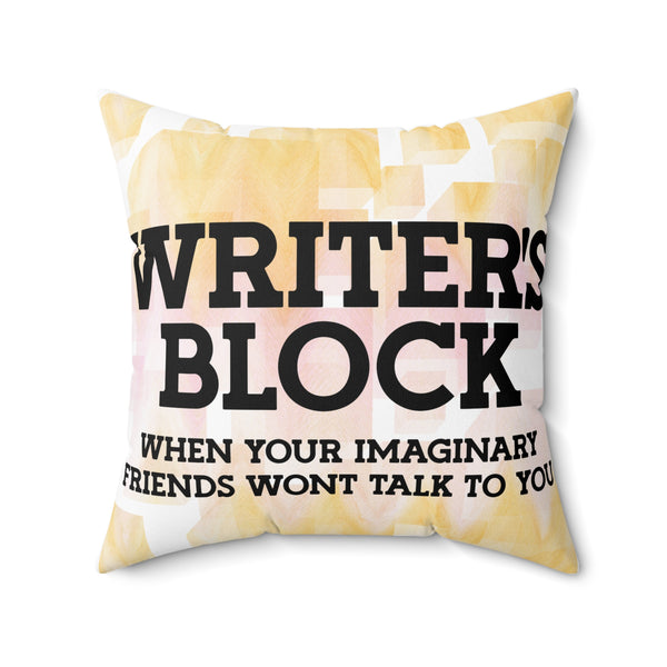 Pillow with text 'WRITER'S BLOCK WHEN YOUR IMAGINARY FRIENDS WON'T TALK TO YOU' on a colorful background