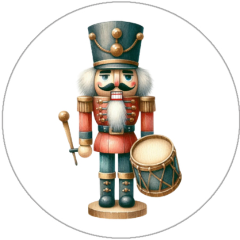 Decorative nutcracker with drum and mallet on a white background
