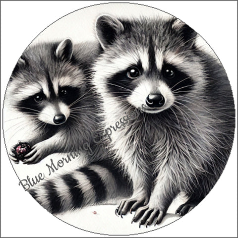 Handmade stickers featuring two raccoons