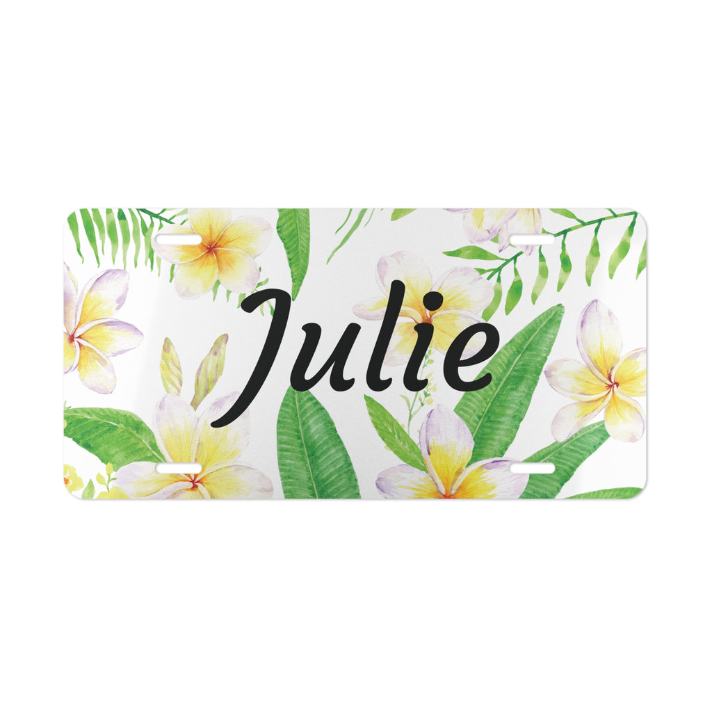 Plumeria Personalized Custom Front License Plate featuring white and yellow plumeria flowers and green leaves on a white backgorund