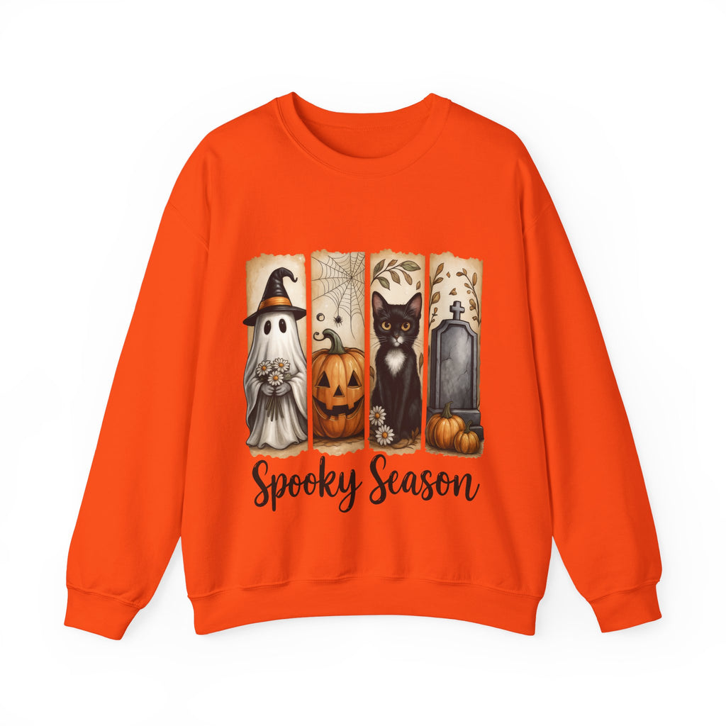 Orange sweatshirt with Halloween-themed design featuring ghost, pumpkin, cat, and tombstone on a white background.
