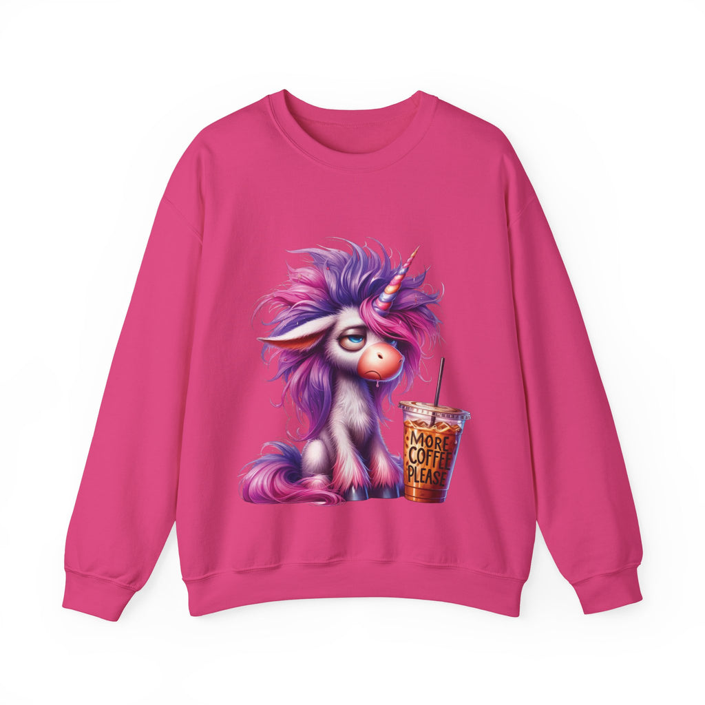 Pink sweatshirt with a unicorn and coffee cup graphic on a white background