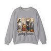 Gray sweatshirt with Halloween-themed design featuring a ghost, pumpkin, black cat, and tombstone on a white background.