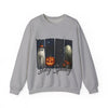 Gray sweatshirt with Halloween-themed design featuring ghosts and pumpkins on a white background.