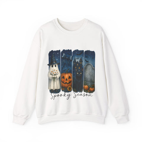 White sweatshirt with Halloween-themed design featuring a ghost, jack-o'-lantern, and castle.