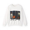 White sweatshirt with Halloween-themed design featuring pumpkins and ghosts on a white background