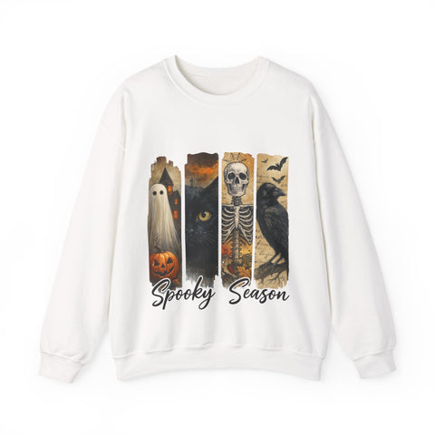 White sweatshirt with Halloween-themed design featuring ghost, cat, skeleton, and owl on a white background.
