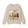 Beige sweatshirt with Halloween-themed design and 'Tis The Season text on a white background