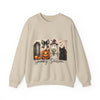 Beige sweatshirt with Halloween-themed design featuring ghosts, a pumpkin, and a black cat on a white background.