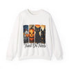 White sweatshirt with Halloween-themed design featuring a pumpkin, ghost, and black cat on a white background.