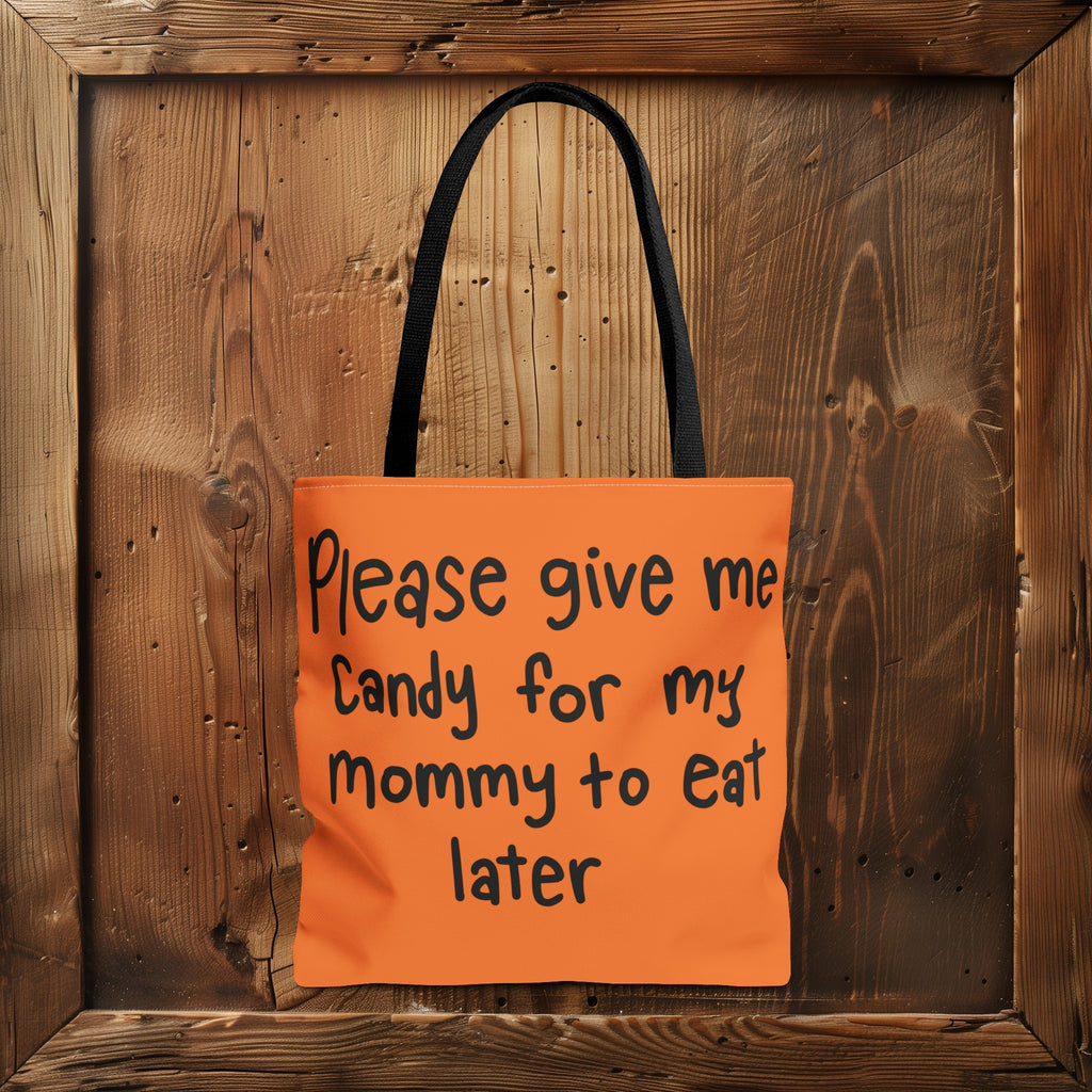 Please Give me Candy Halloween Trick or Treat Bag on a wooden surface