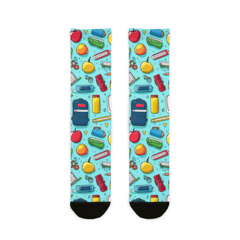 Colorful socks with school-themed design on a light blue background