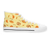 High-top sneaker with a yellow pattern on a white background