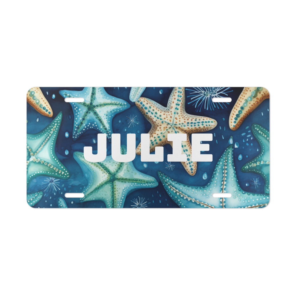 License plate with starfish design and 'JULIE' text on a blue background