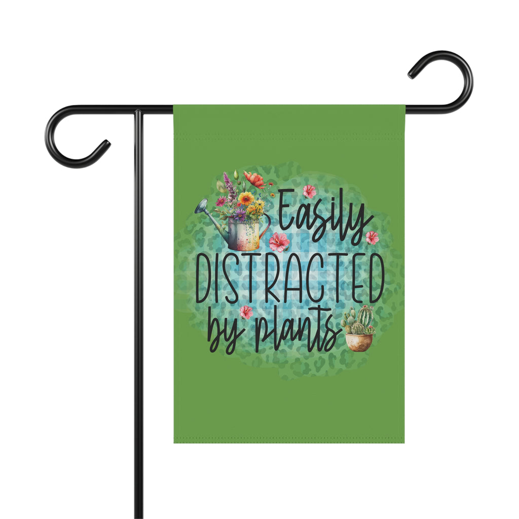 Garden flag with 'Easily Distracted by Plants' text and plant illustrations on a green background.