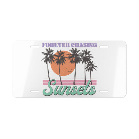 License plate with palm trees and sunset design, text 'Forever Chasing Sunsets' on a white background