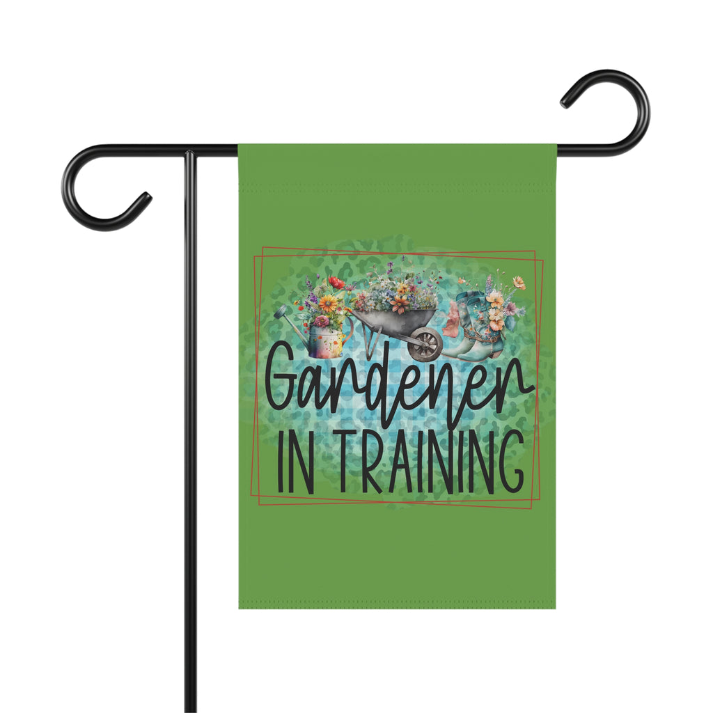 Garden flag with 'Gardener in Training' text and floral design on a green background.