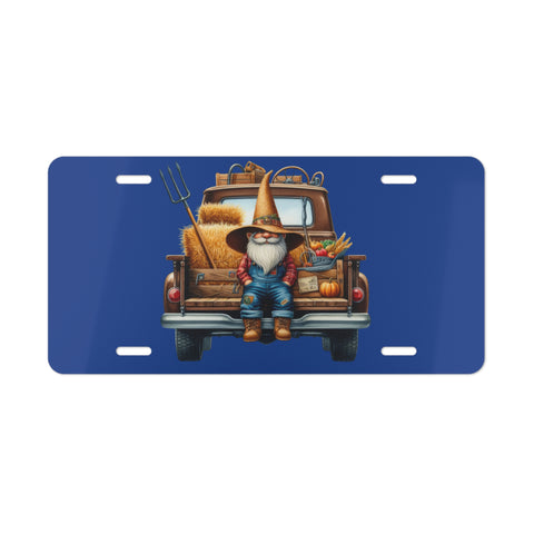 License plate with a gnome and truck design on a blue background