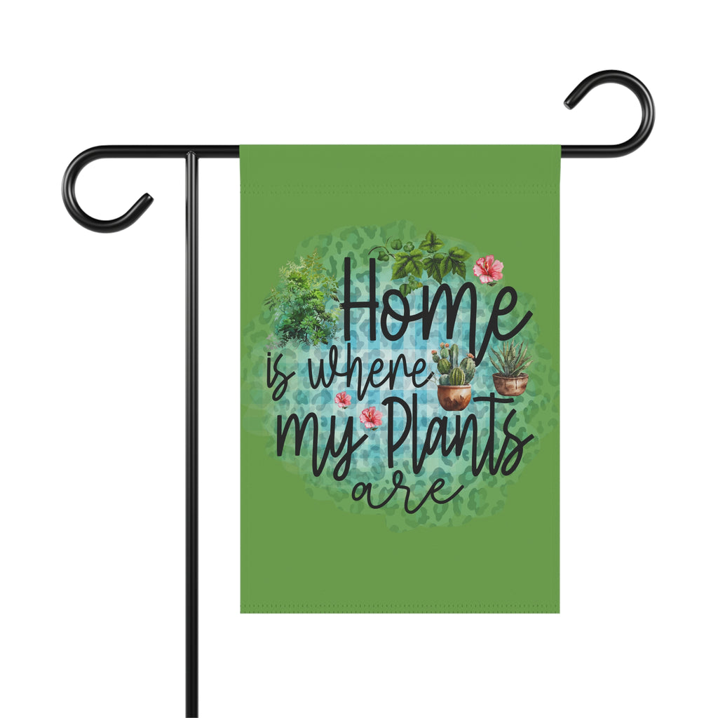 Garden flag with 'Home is where my plants are' text and plant illustrations on a green background.