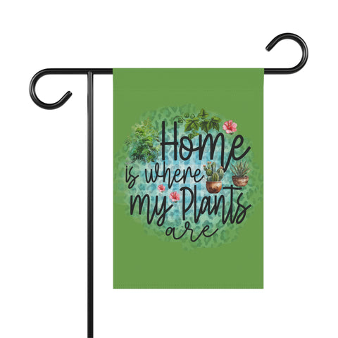 Garden flag with 'Home is where my plants are' text and plant illustrations on a green background.