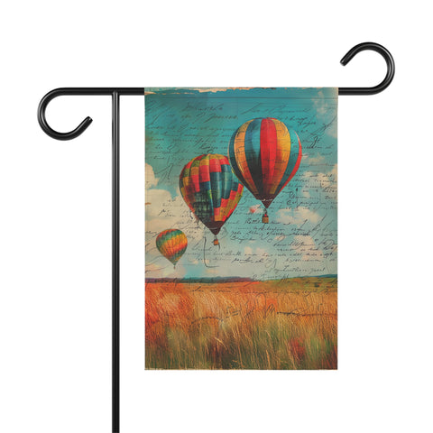 Decorative garden flag with hot air balloons and a field design on a stand.