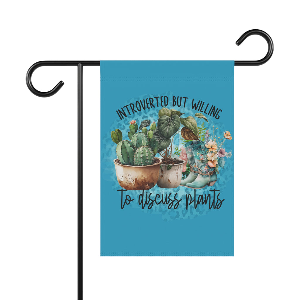 Garden flag with cacti design and text on a blue background