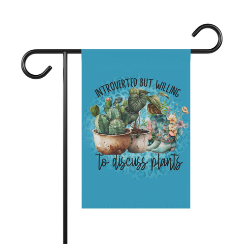 Garden flag with cacti design and text on a blue background