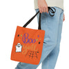 Boo Y'all Halloween Trick or Treat Bag in the hand of an adult male