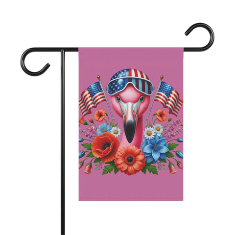 Flamingo garden flag with American flags, flowers, and a helmet on a pink background.