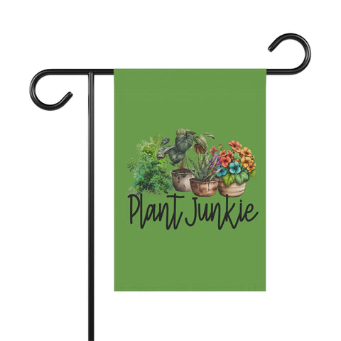 Garden flag with plants and 'Plant Junkie' text on a green background