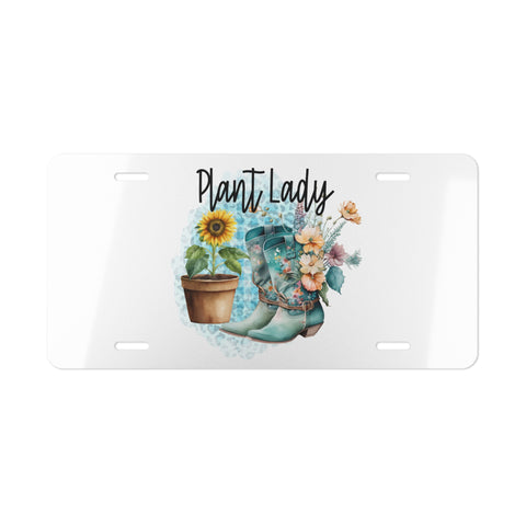 License plate with 'Plant Lady' text, boots, sunflower, and flowers on a white background