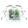 Apron with cactus design and 'Plants are my therapy' text on a white background