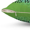 Green pillow with text and pattern on a white background