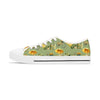 Sneaker with bicycle and yellow flower pattern on a white background