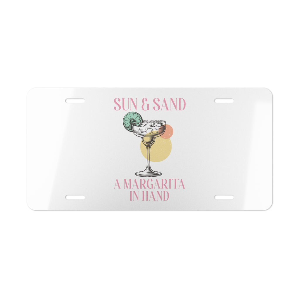 License plate with a margarita design and text 'Sun & Sand, A Margarita In Hand' on a white background